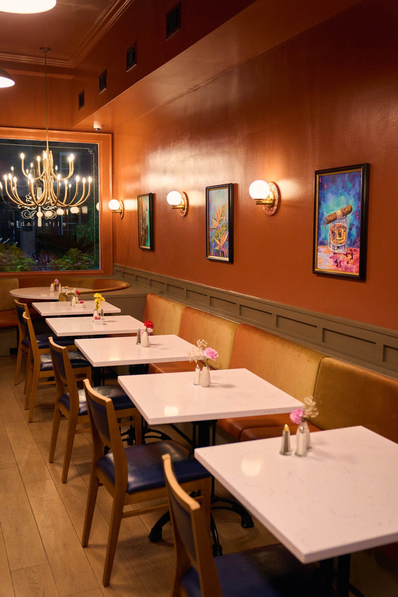 Banquette seating in the dining room at Eli's Table, a Charleston hospitality business