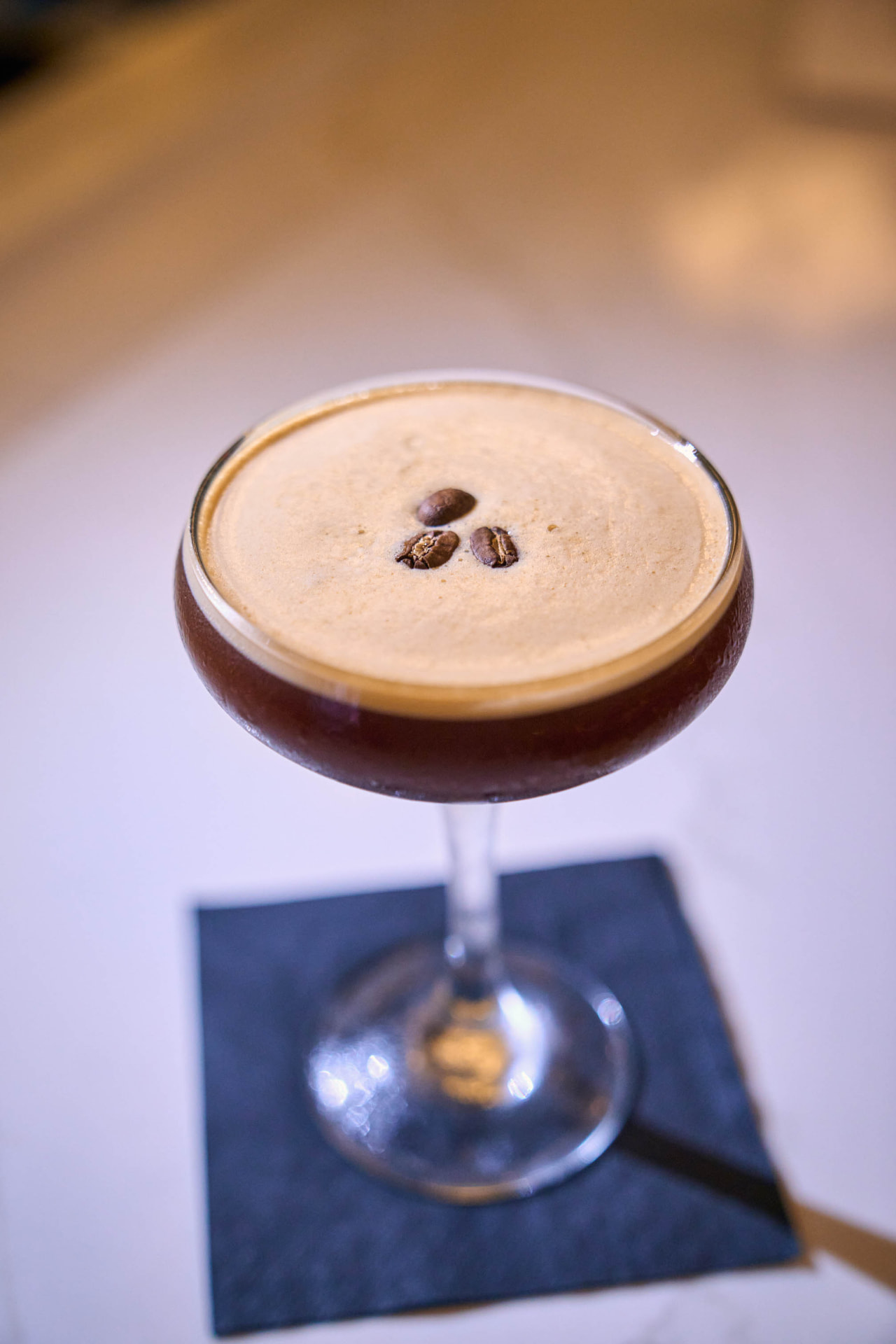 An espresso martini at the bar at Eli's Table, one of the best date night restaurants in Charleston SC